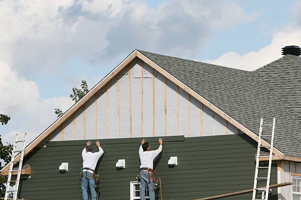 Professional Siding technician working in Beltsville, MD